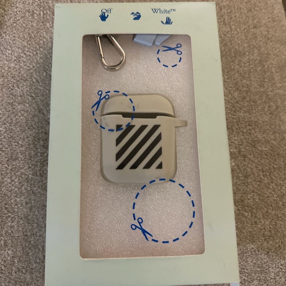 Off-White AirPods Case with diagonal Black Accents and lanyard